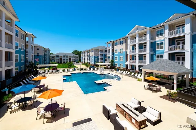 a view of a building with swimming pool