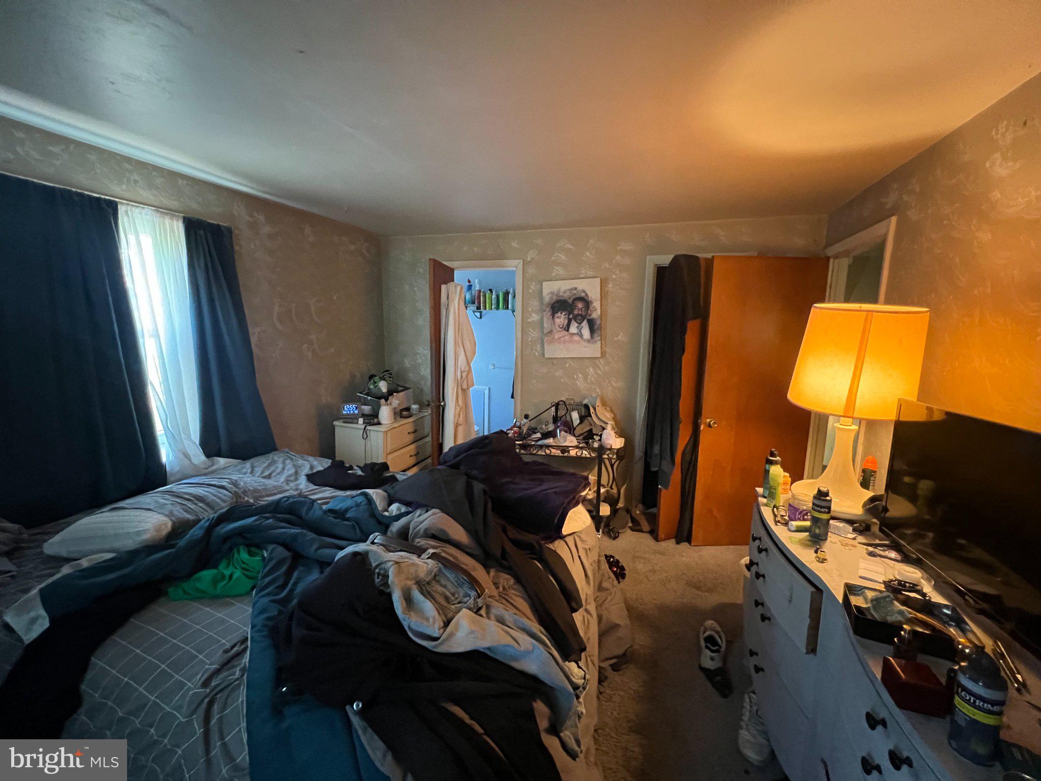 1346 Clarke Road Abington, PA 19001 - Photo 18 of 28 Cluttered retreat with warm light.