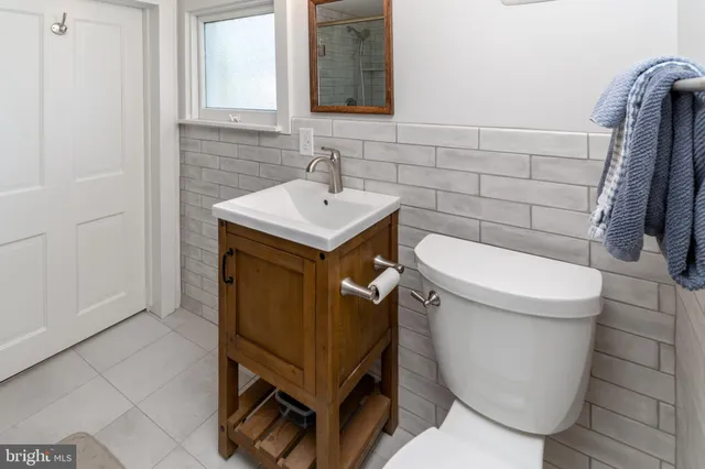 a bathroom with a sink and a toilet