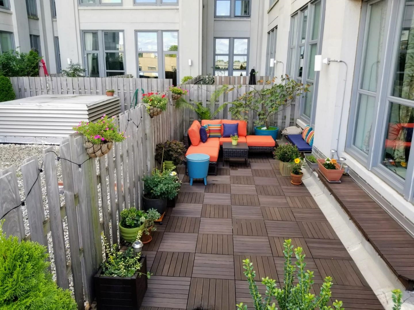 50 Dey Street, Unit 259 Jersey City, NJ 07306 - Photo 12 of 24 a view of a patio with couches table and chairs and potted plants
