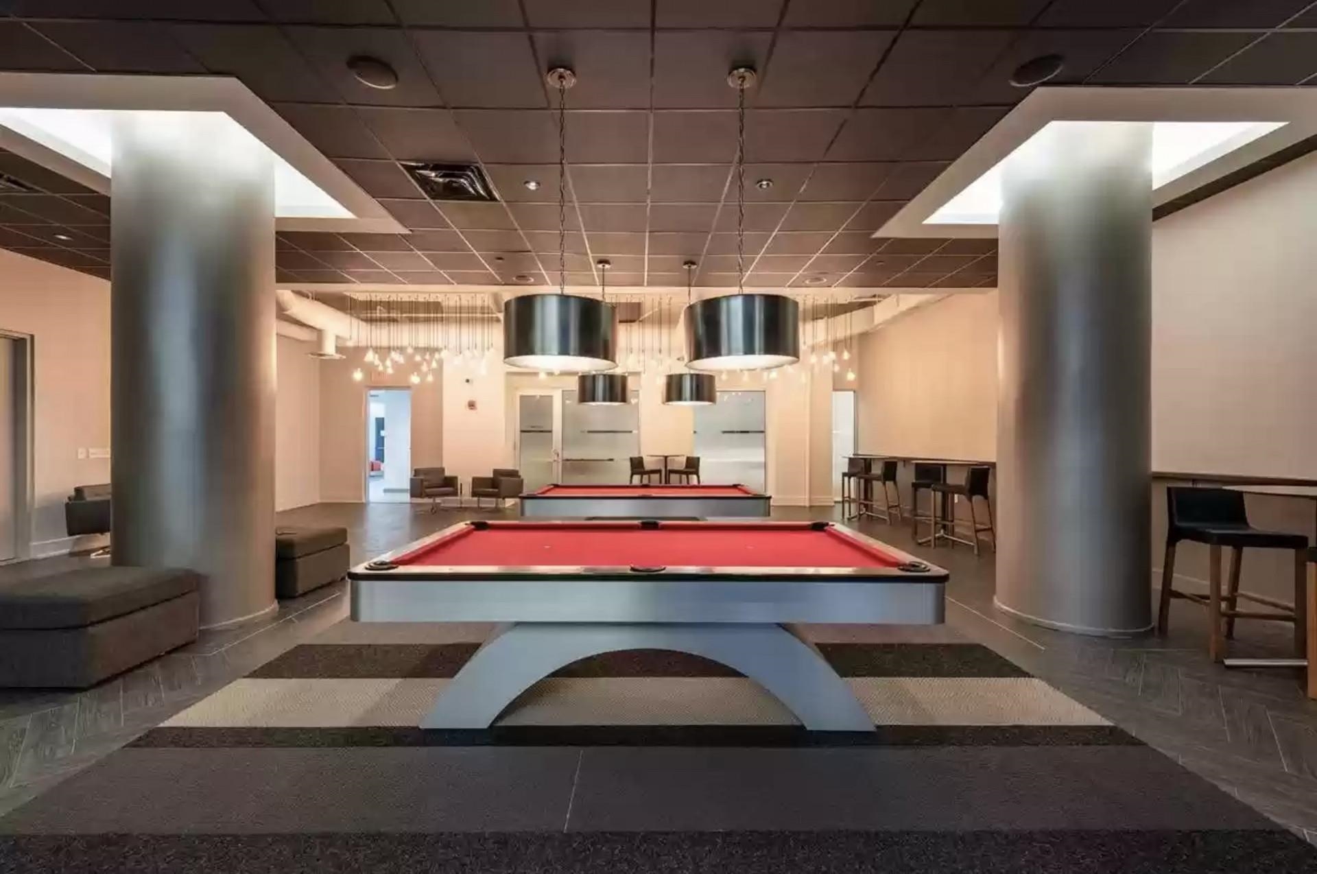 50 Dey Street, Unit 259 Jersey City, NJ 07306 - Photo 15 of 24 a room with pool table and wooden floor