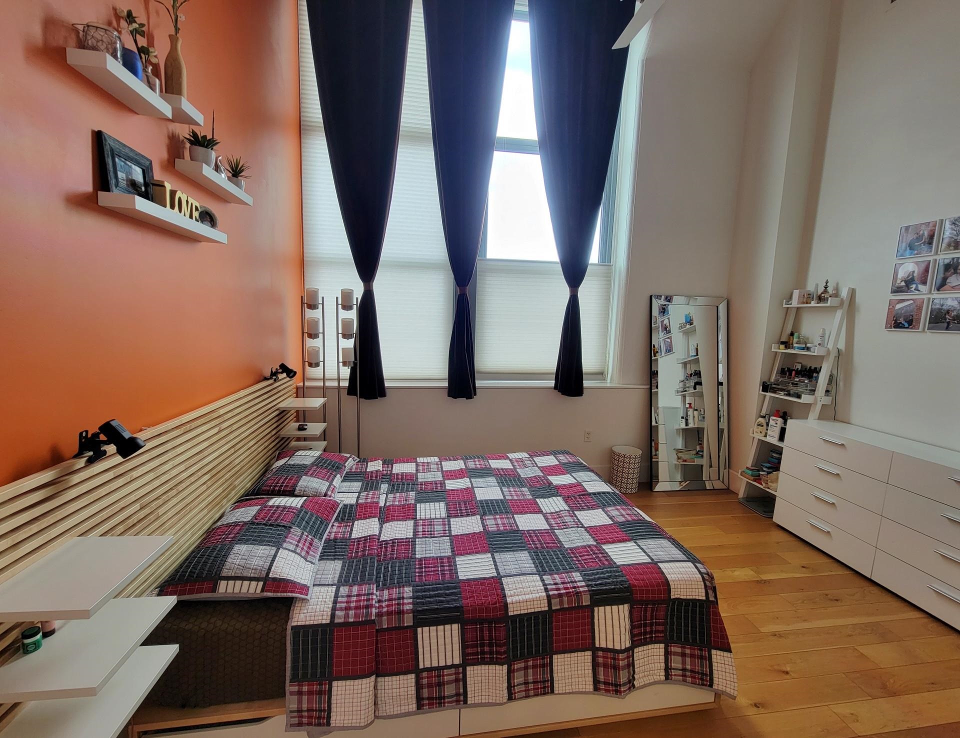 50 Dey Street, Unit 259 Jersey City, NJ 07306 - Photo 7 of 24 a bedroom with a bed and window