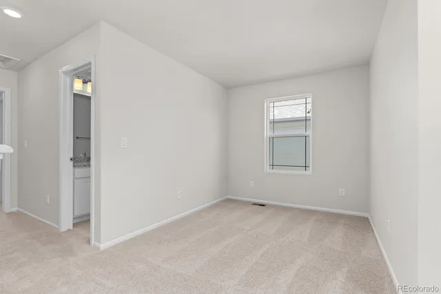 a bathroom with a double vanity sink mirror and shower
