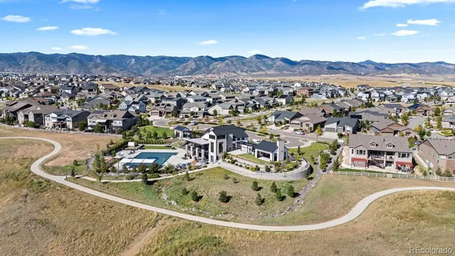 a view of a swimming pool with an ocean view