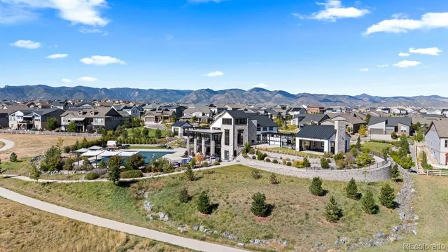 a view of kitchen with wooden floor and windows
