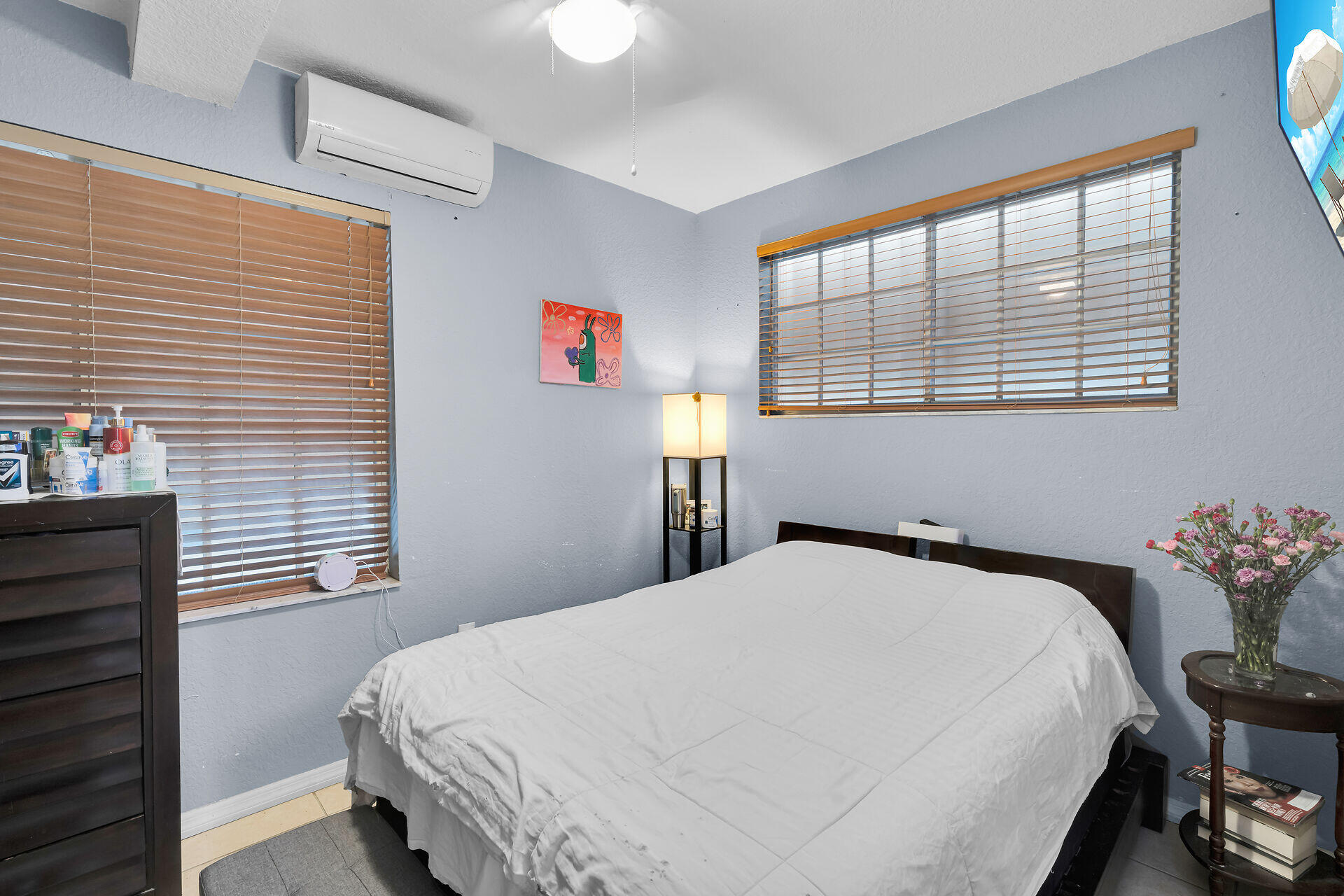 64 Coconut Drive Key Largo, FL 33037 - Photo 30 of 54 a bedroom with a bed and a window