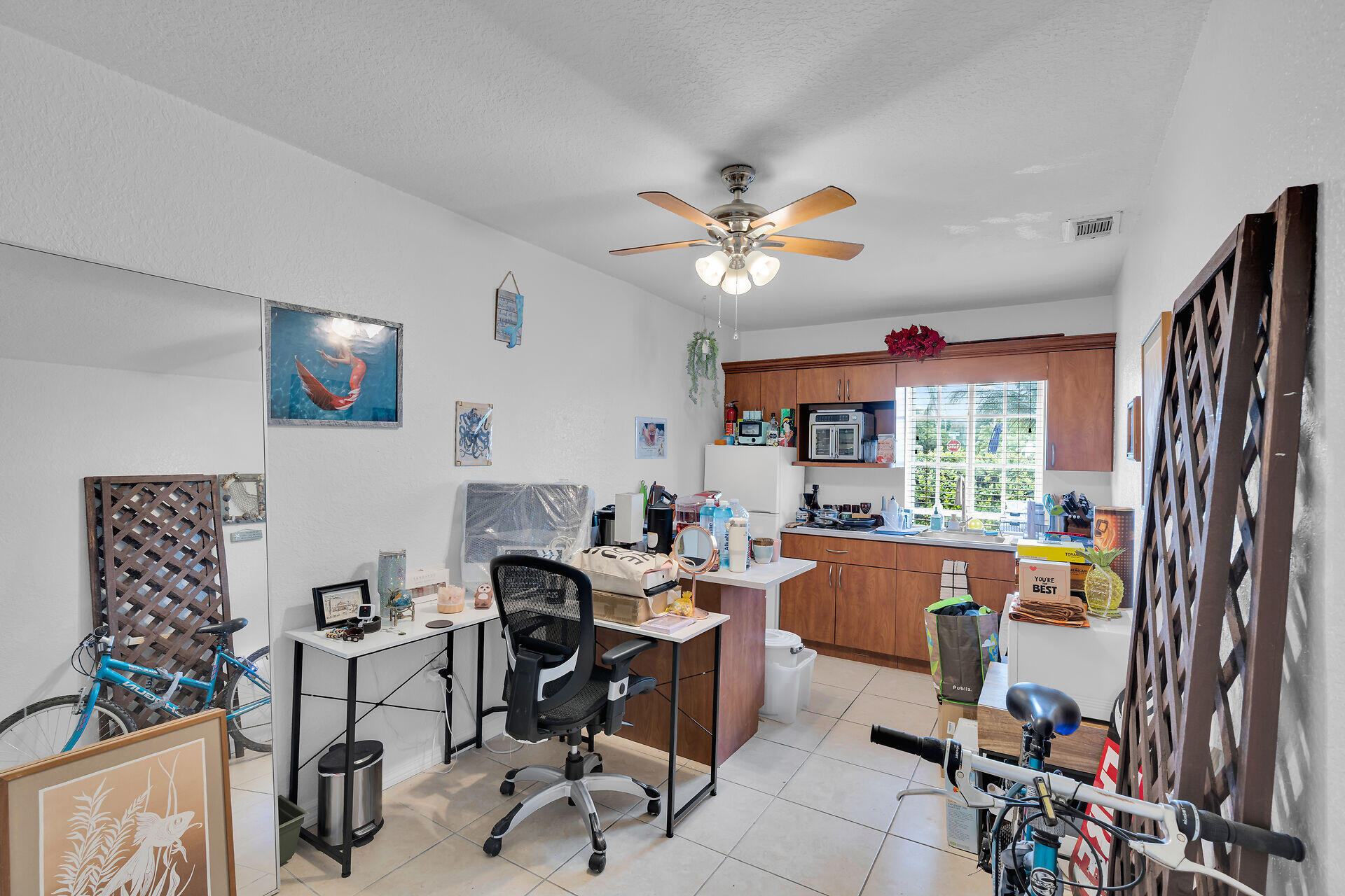 64 Coconut Drive Key Largo, FL 33037 - Photo 34 of 54 a view of a workspace with furniture and a window