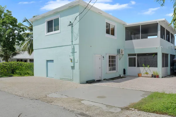 a view of a house with a street