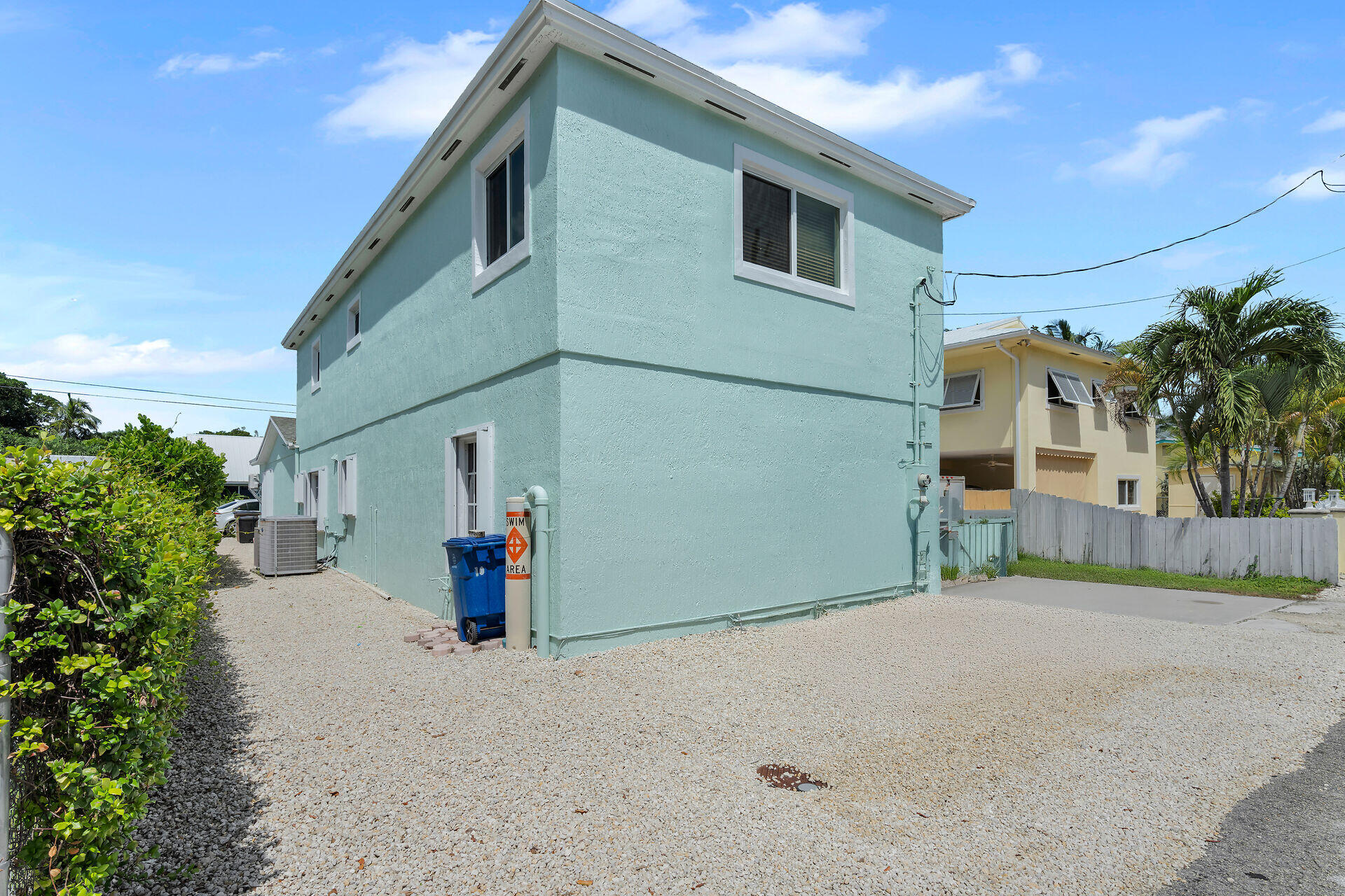 64 Coconut Drive Key Largo, FL 33037 - Photo 44 of 54 a view of a house with a yard