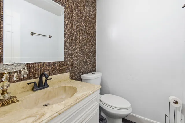 a bathroom with a sink and a toilet