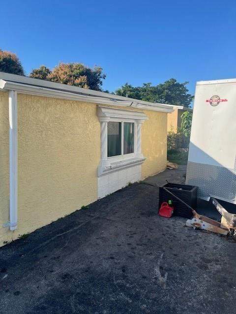 280 Northeast 23rd Street Pompano Beach, FL 33060 - Photo 5 of 12 a view of a house with a backyard