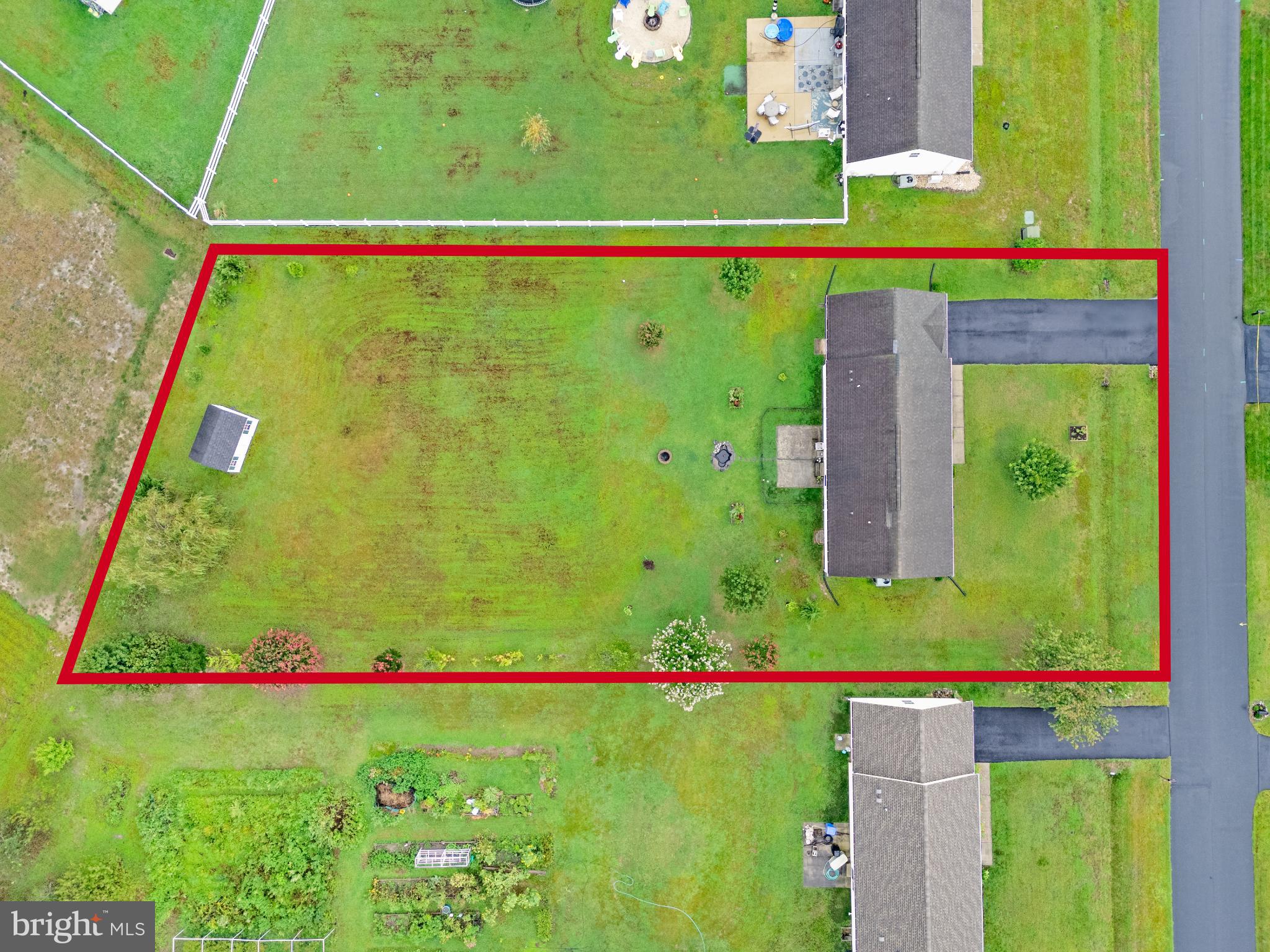 30147 Regatta Bay Boulevard Lewes, DE 19958 - Photo 12 of 74 a green field with view of tall buildings