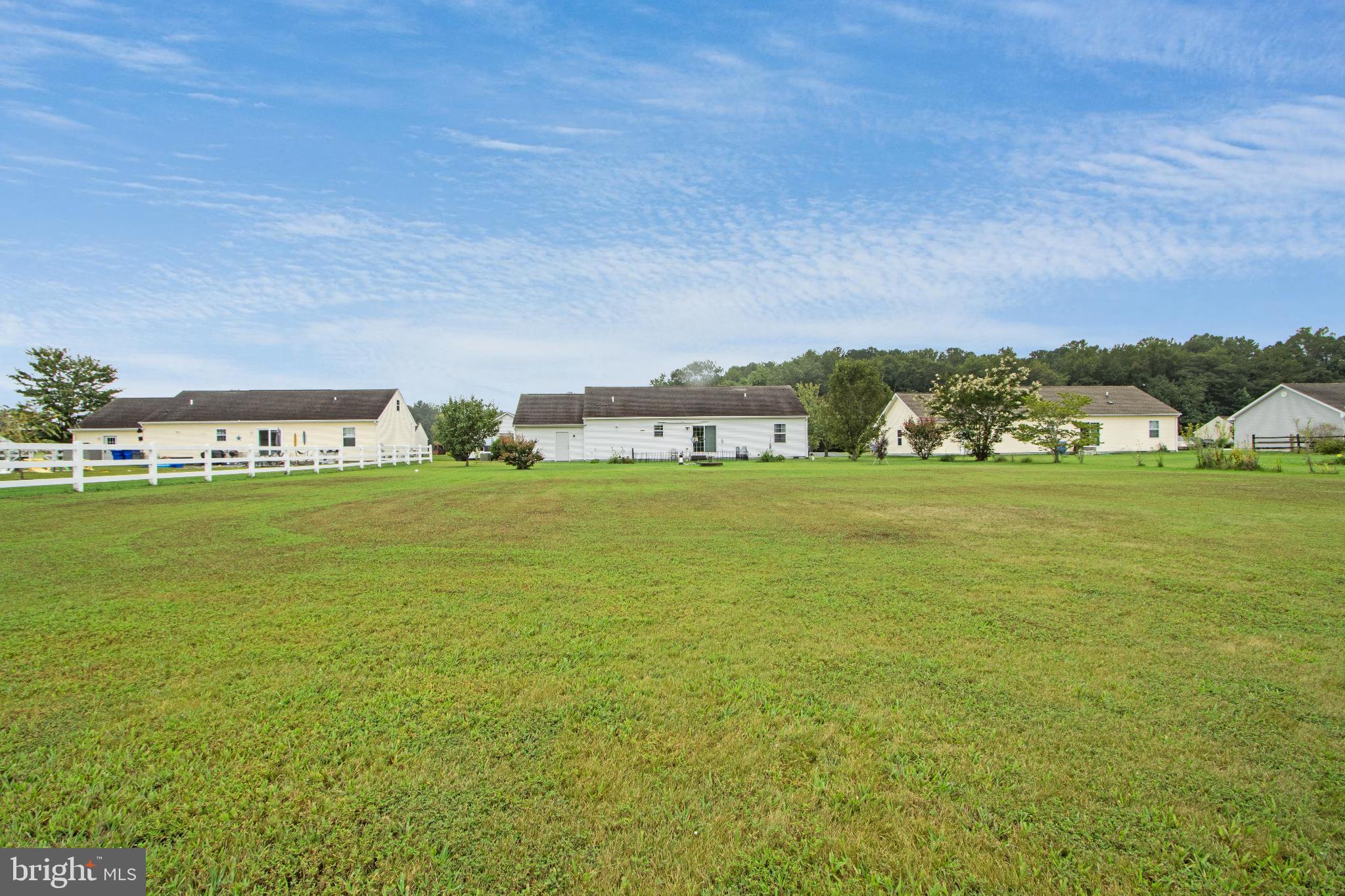 30147 Regatta Bay Boulevard Lewes, DE 19958 - Photo 19 of 74 Spacious green expanse with charming homes.