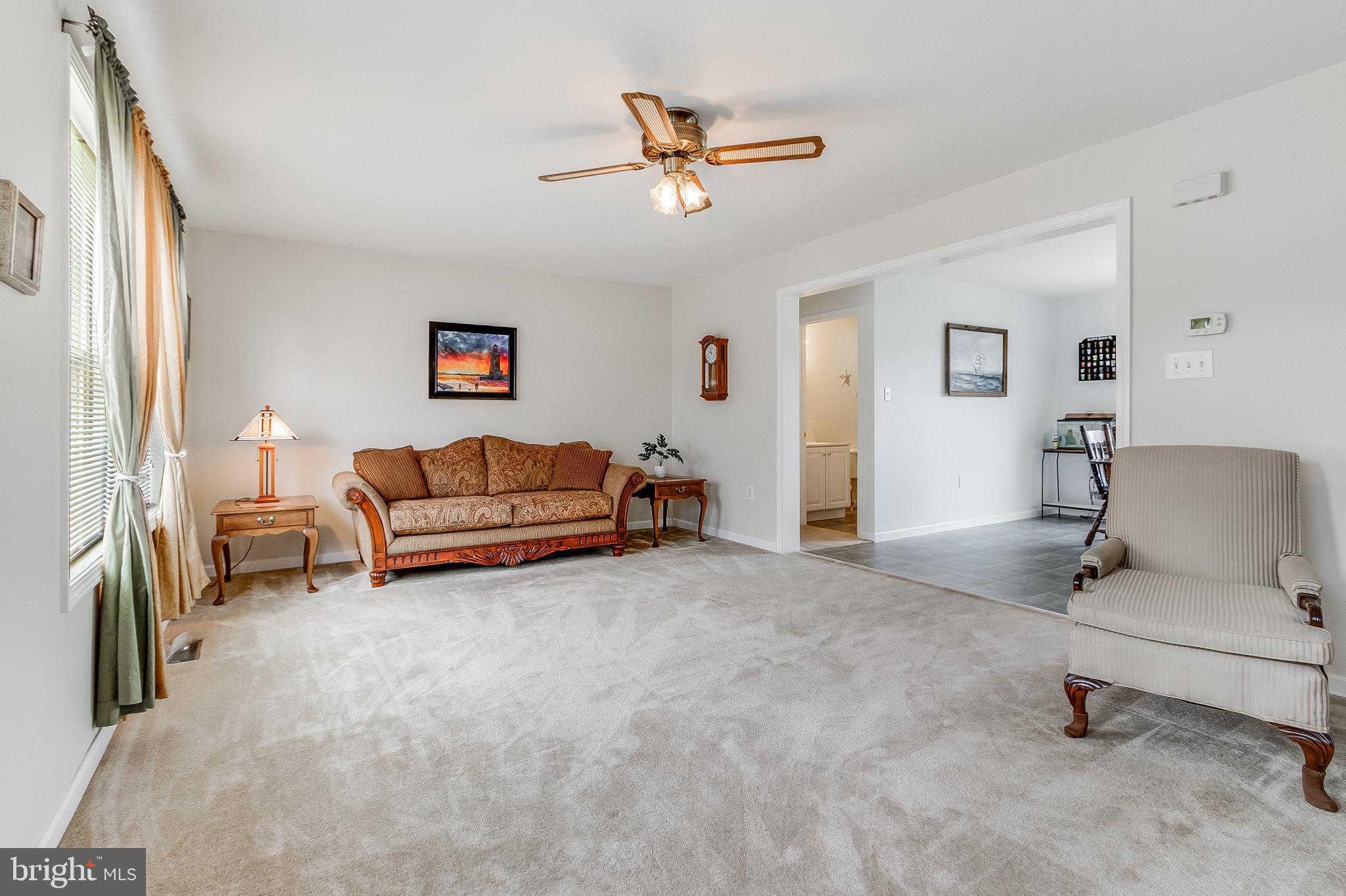 30147 Regatta Bay Boulevard Lewes, DE 19958 - Photo 21 of 74 a living room with furniture and a rug