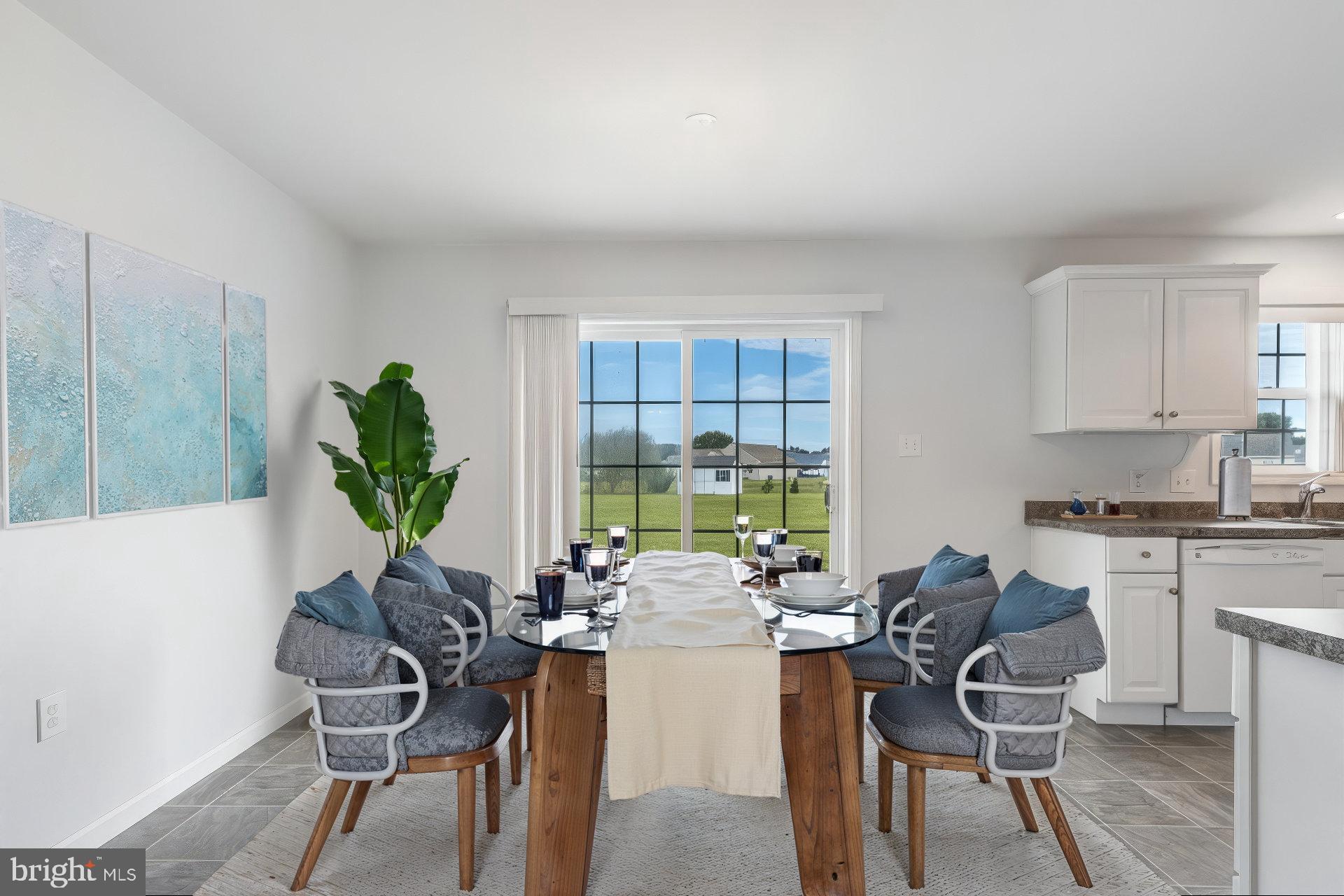 30147 Regatta Bay Boulevard Lewes, DE 19958 - Photo 31 of 74 a view of a dining room with furniture window and outside view