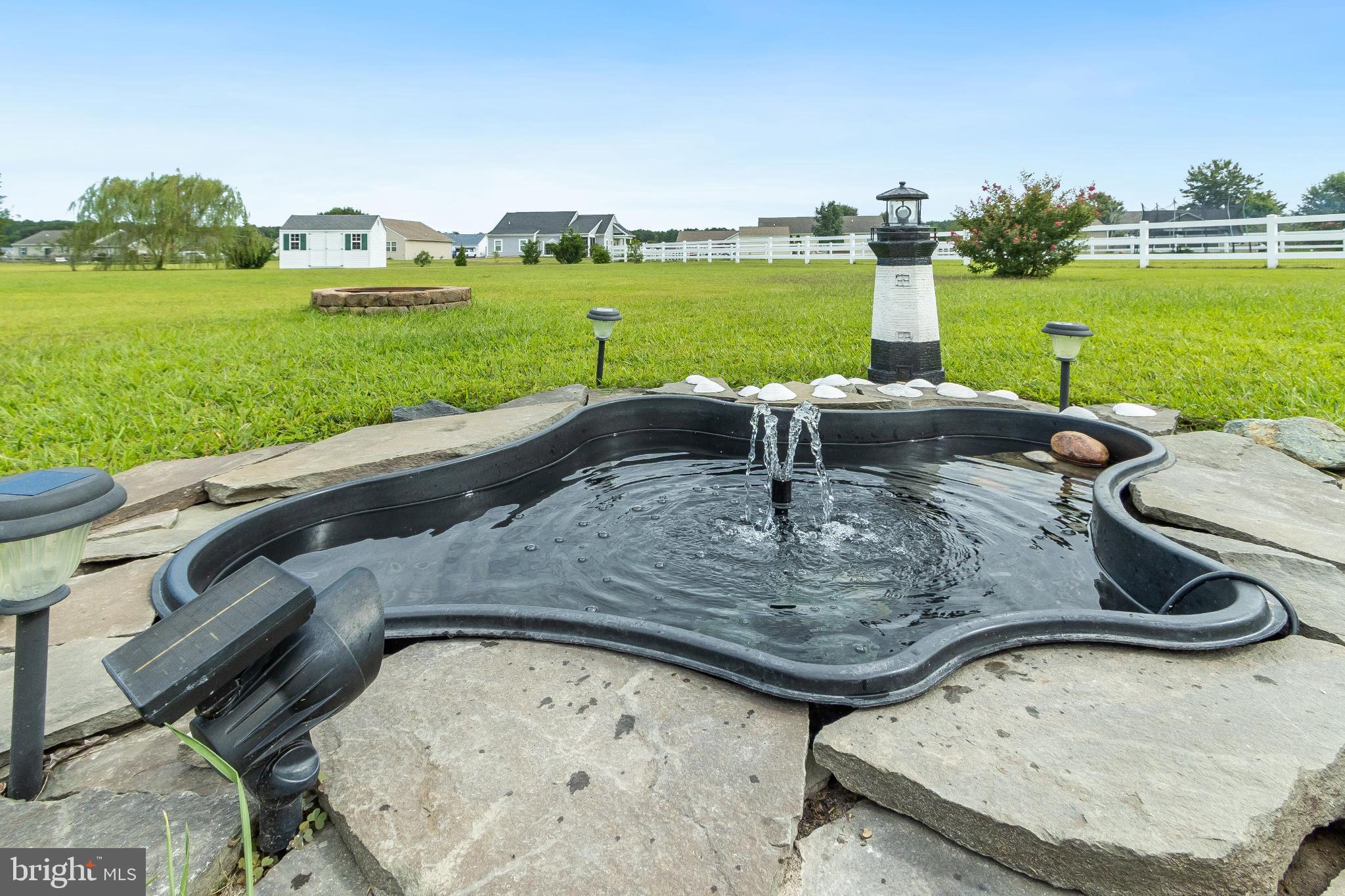 30147 Regatta Bay Boulevard Lewes, DE 19958 - Photo 33 of 74 a view of a swimming pool and outdoor space