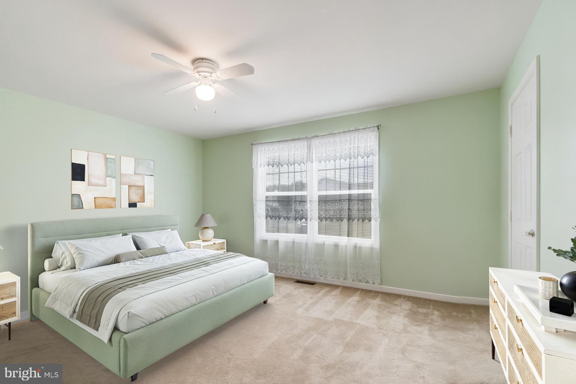 30147 Regatta Bay Boulevard Lewes, DE 19958 - Photo 44 of 74 a bedroom with a bed and a window