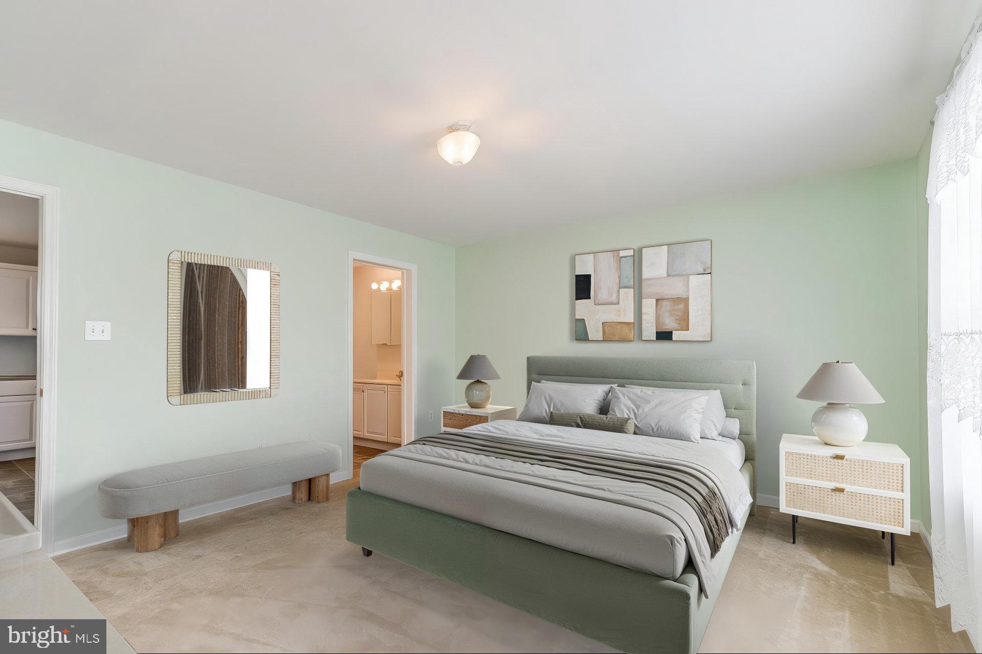 30147 Regatta Bay Boulevard Lewes, DE 19958 - Photo 47 of 74 a bedroom with a bed and a lamp