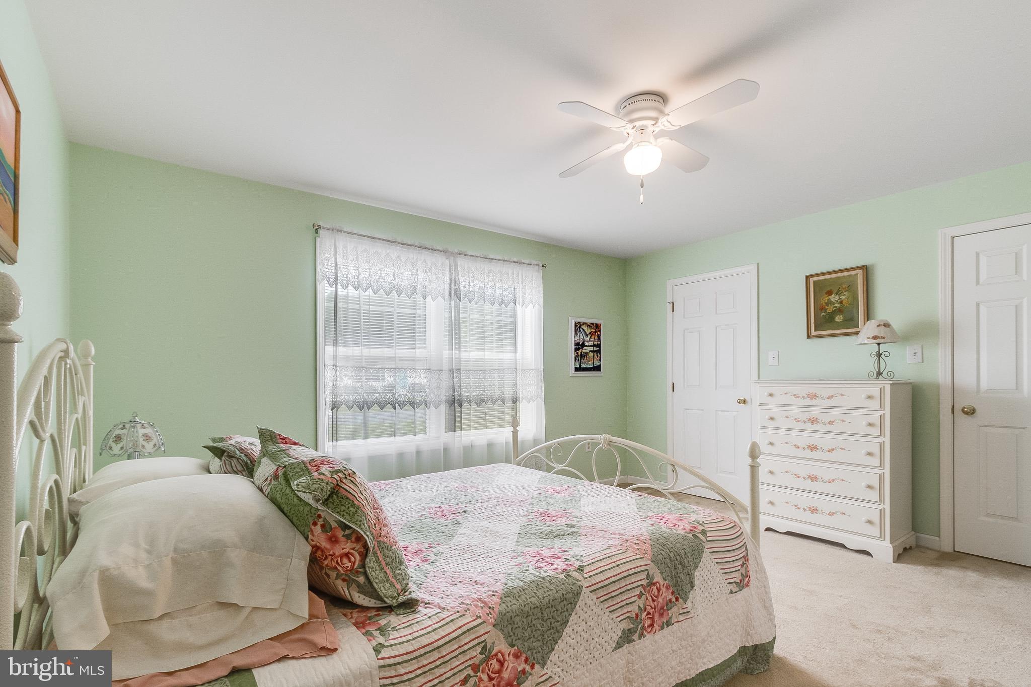 30147 Regatta Bay Boulevard Lewes, DE 19958 - Photo 48 of 74 Primary bedroom with his and hers closets.