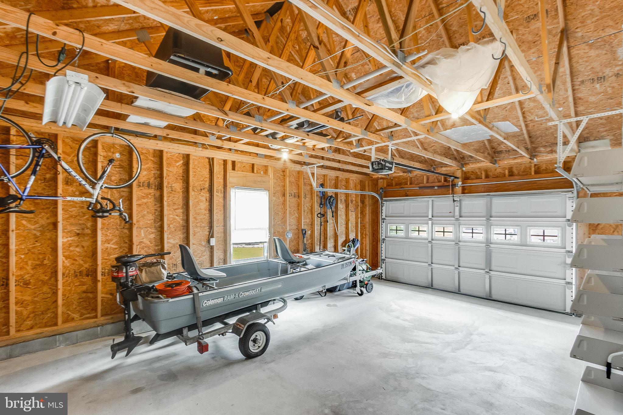 30147 Regatta Bay Boulevard Lewes, DE 19958 - Photo 60 of 74 Spacious garage with ample storage.