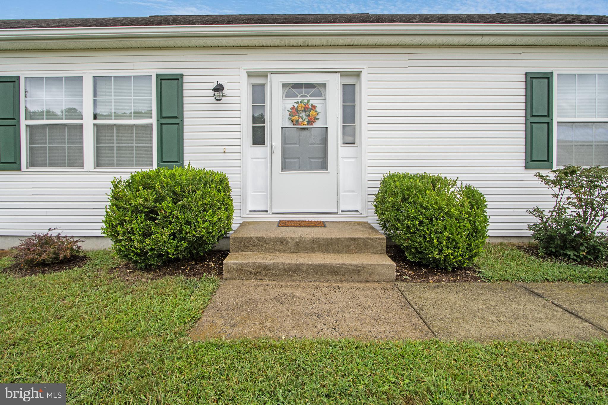 30147 Regatta Bay Boulevard Lewes, DE 19958 - Photo 6 of 74 a view of a backyard with potted plants
