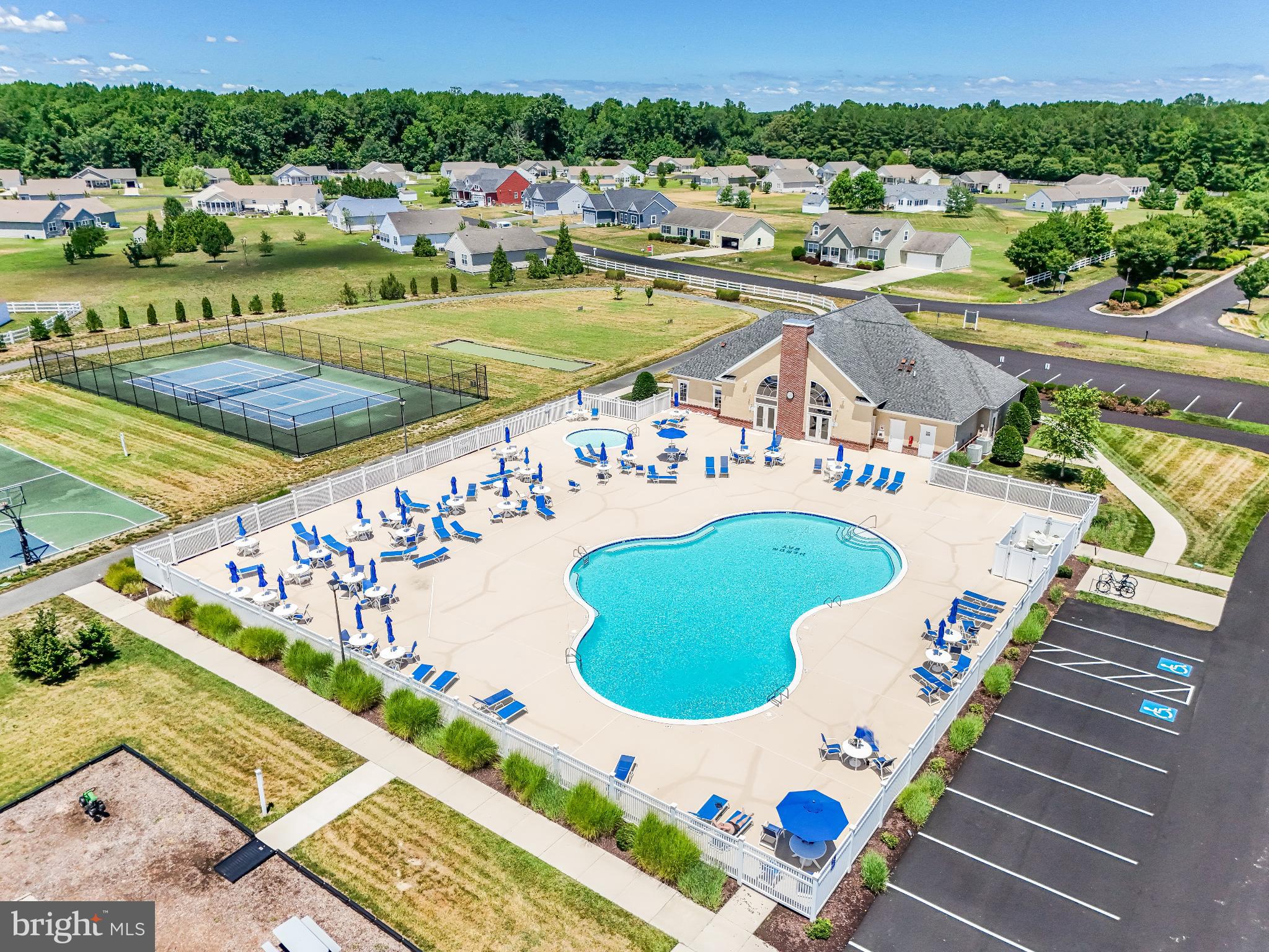 30147 Regatta Bay Boulevard Lewes, DE 19958 - Photo 67 of 74 an aerial view of a swimming pool and outdoor space