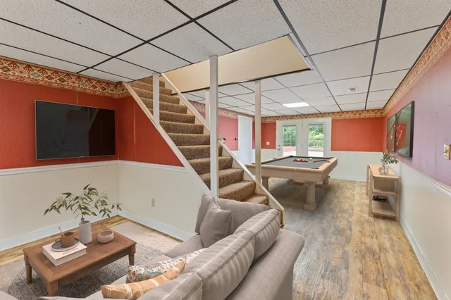 a view of a yard with swimming pool