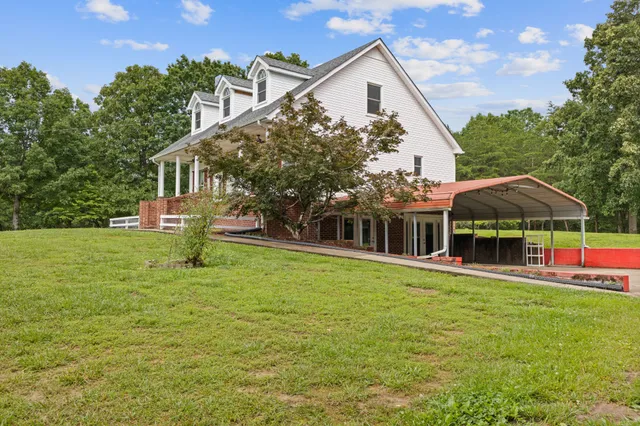 a kitchen with granite countertop a stove and a refrigerator