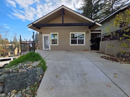 102 Shadow Wood Place Colfax, CA 95713 - Photo 1 of 15 a front view of a house with a yard