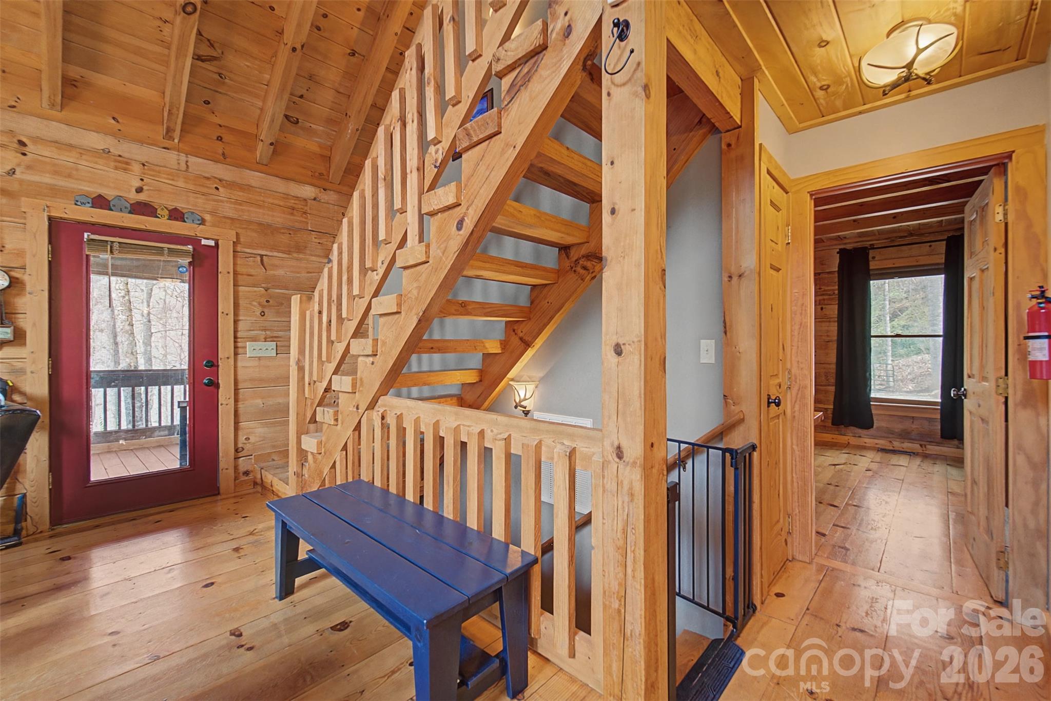 170 Wilkes Road Bryson City, NC 28713 - Photo 15 of 47 a view of an entryway with wooden floor and door
