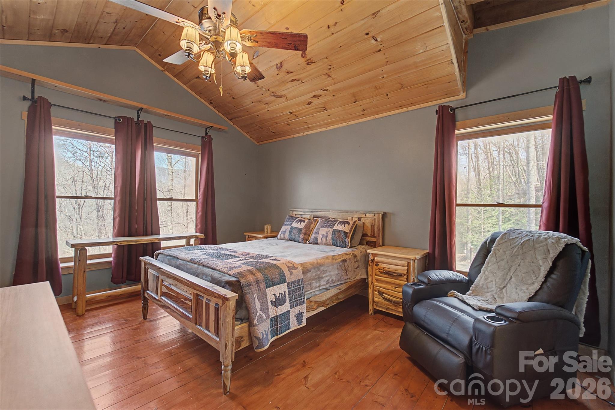 170 Wilkes Road Bryson City, NC 28713 - Photo 23 of 47 a bedroom with a bed couch and window