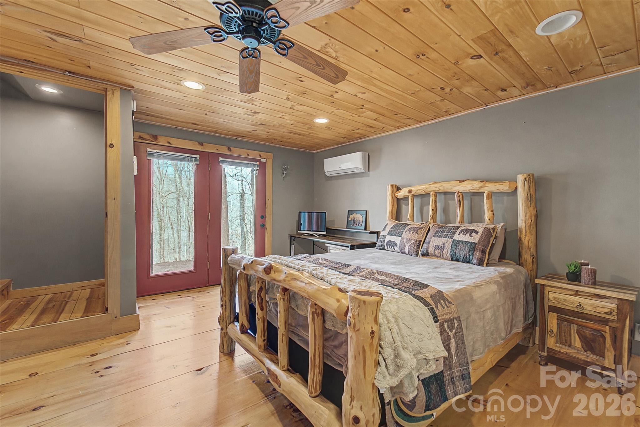 170 Wilkes Road Bryson City, NC 28713 - Photo 28 of 47 a bedroom with a bed next to a window