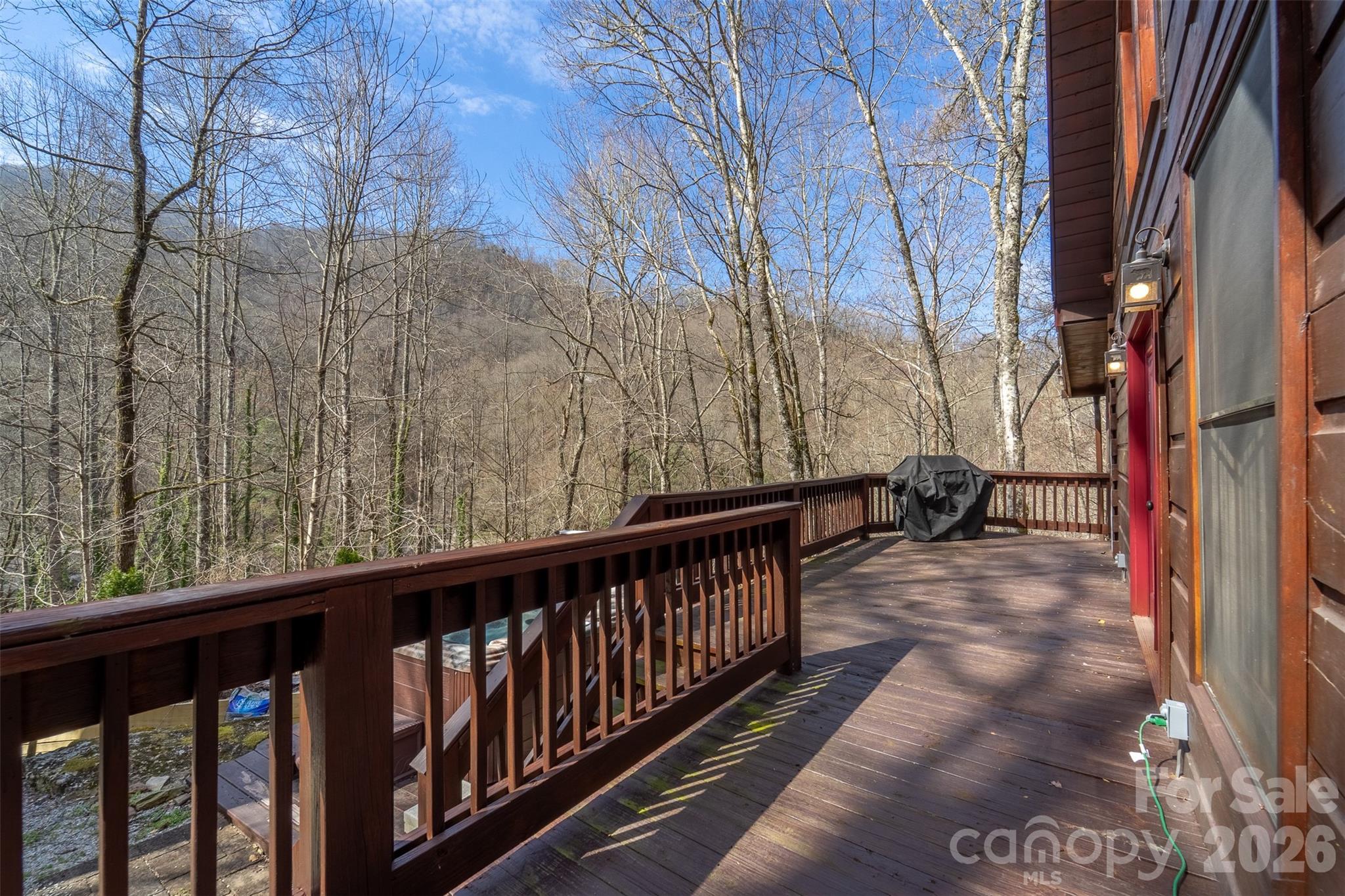 170 Wilkes Road Bryson City, NC 28713 - Photo 29 of 47 a view of a pathway of a balcony