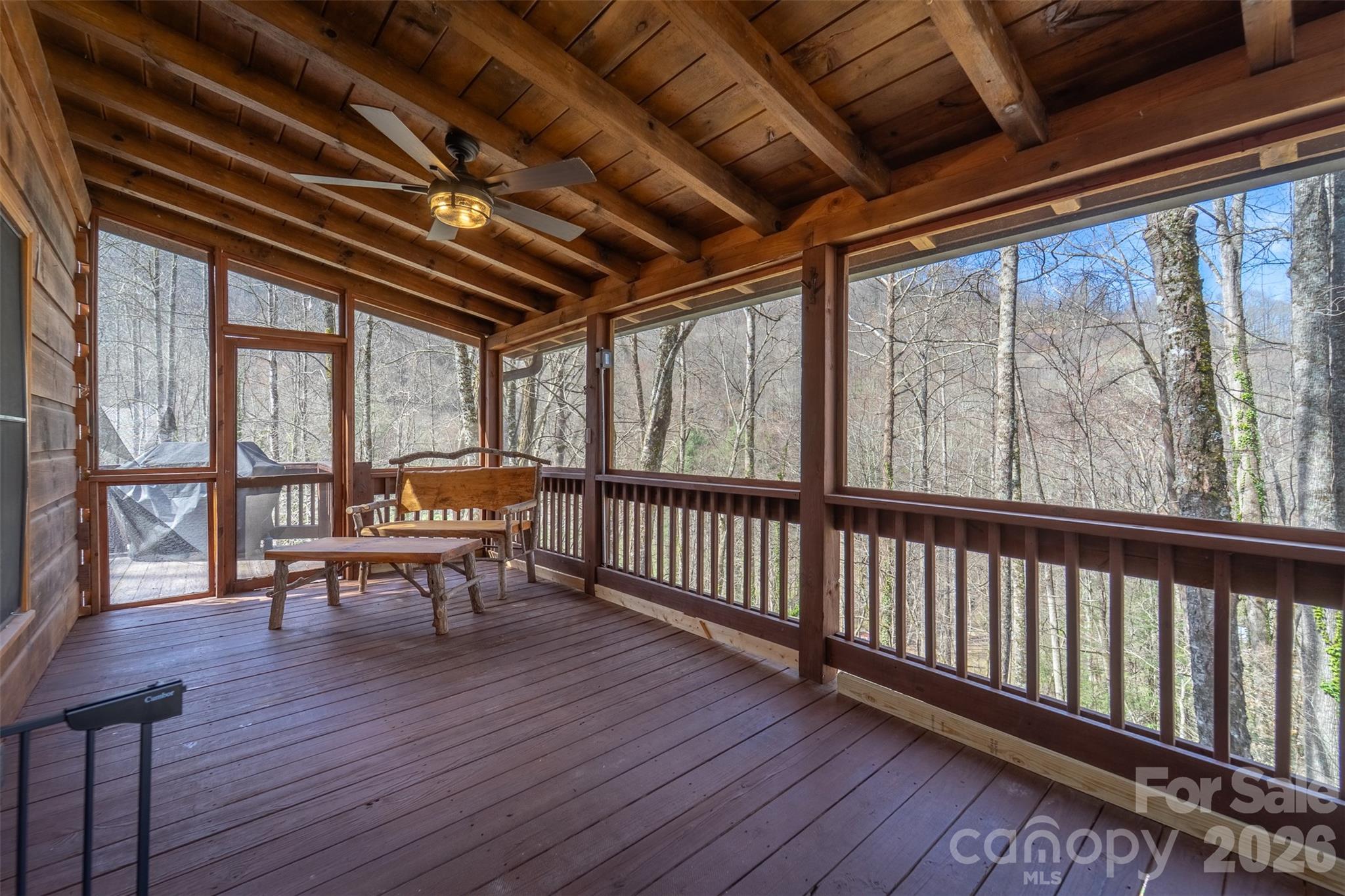 170 Wilkes Road Bryson City, NC 28713 - Photo 33 of 47 a view of a porch with furniture and wooden floor