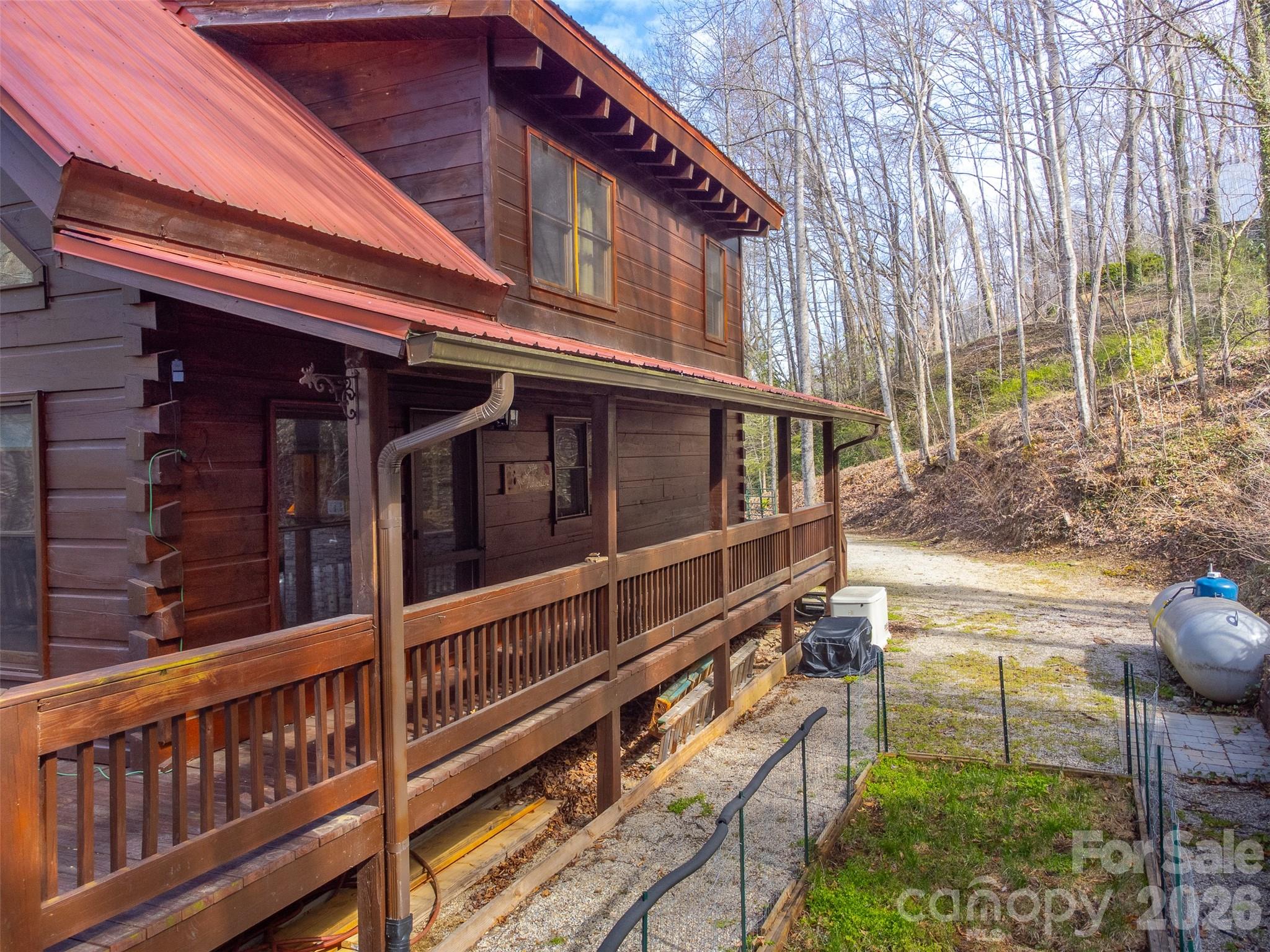 170 Wilkes Road Bryson City, NC 28713 - Photo 38 of 47 front view of a house with a large window