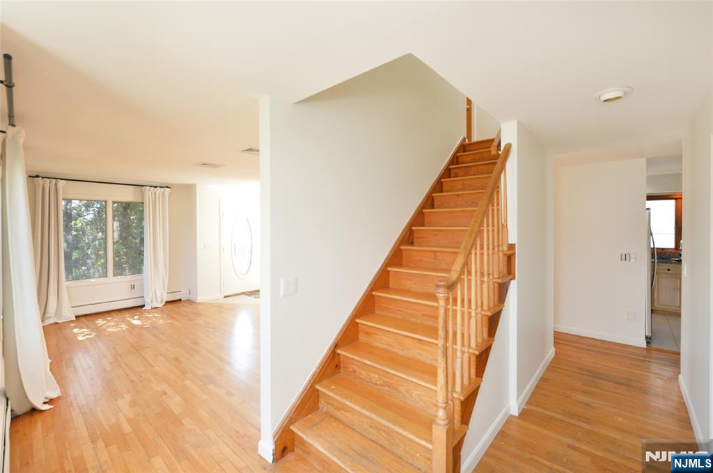 73 South Prospect Avenue Hackensack, NJ 07601 - Photo 12 of 28 a view of an entryway with wooden floor and a rug