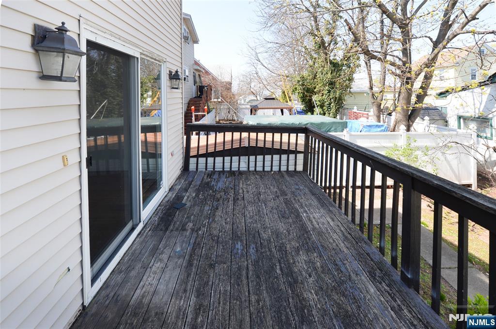 73 South Prospect Avenue Hackensack, NJ 07601 - Photo 26 of 28 a view of a wooden street from a balcony