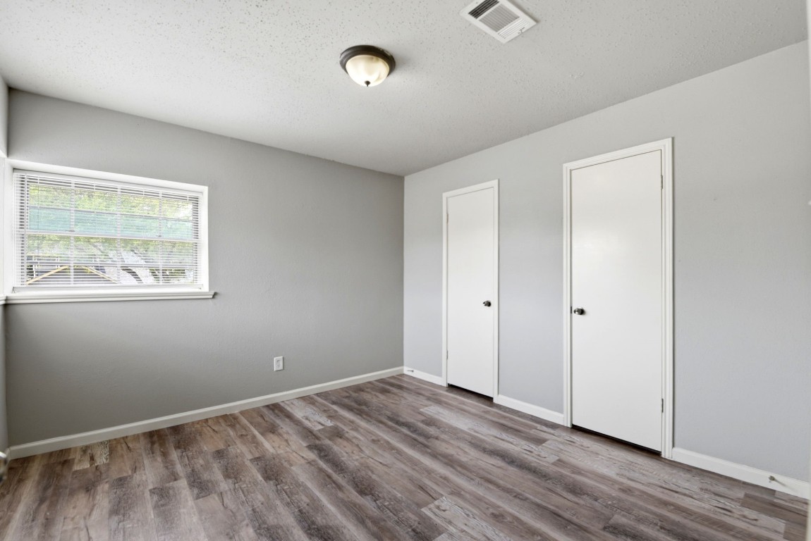 22910 Sherioaks Lane Spring, TX 77389 - Photo 18 of 27 a view of room with window and wooden floor