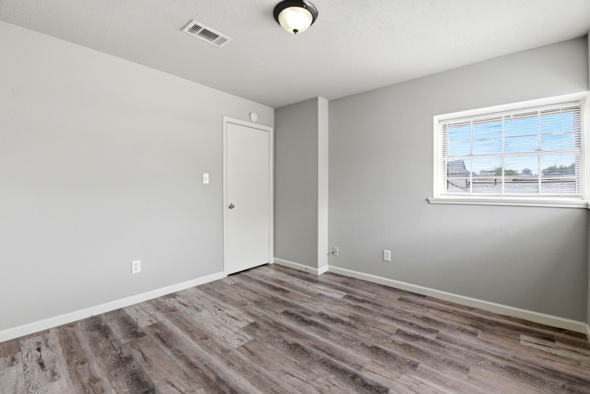 22910 Sherioaks Lane Spring, TX 77389 - Photo 22 of 27 a view of a livingroom with wooden floor and window