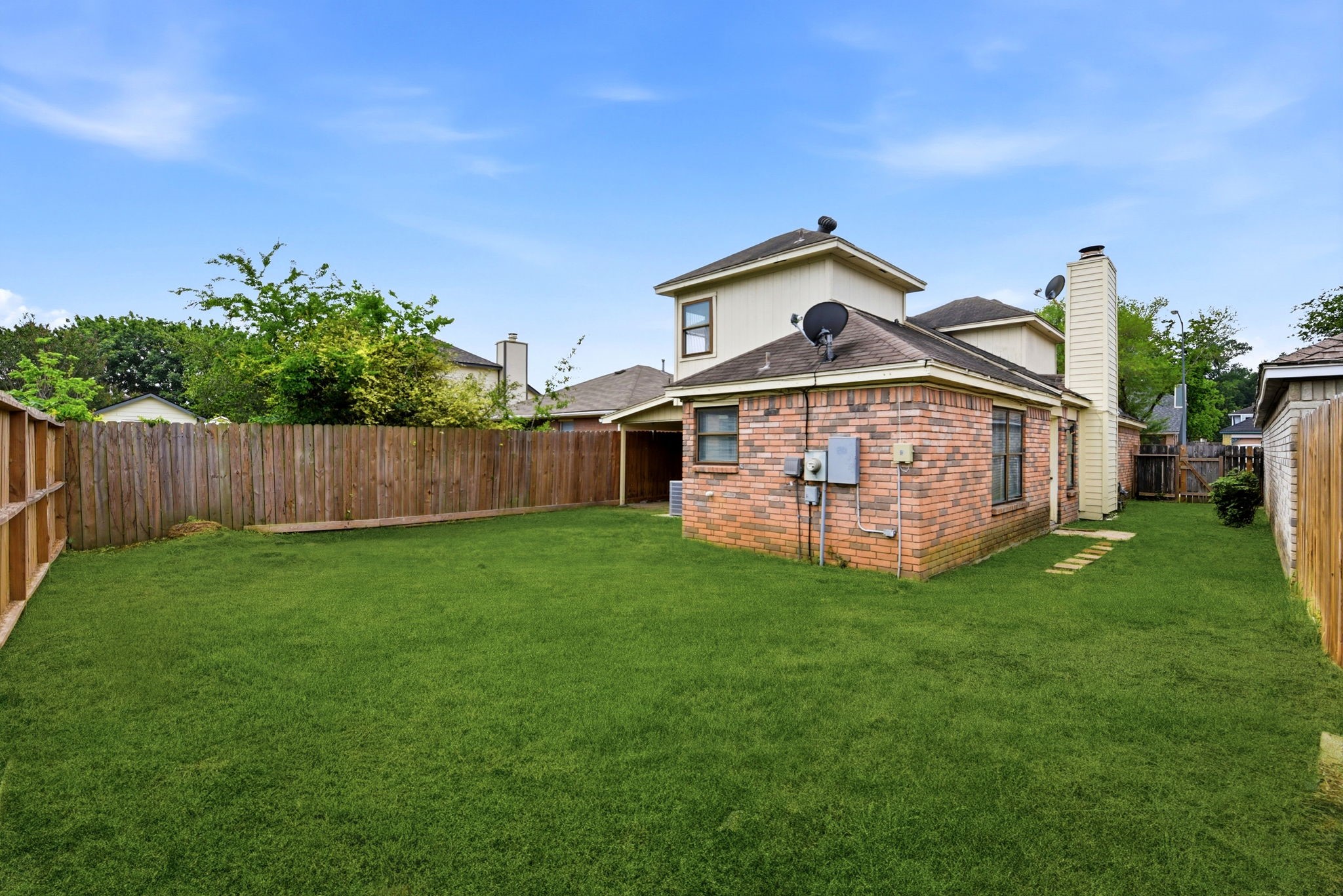 22910 Sherioaks Lane Spring, TX 77389 - Photo 26 of 27 a view of a house with a big yard plants and large trees
