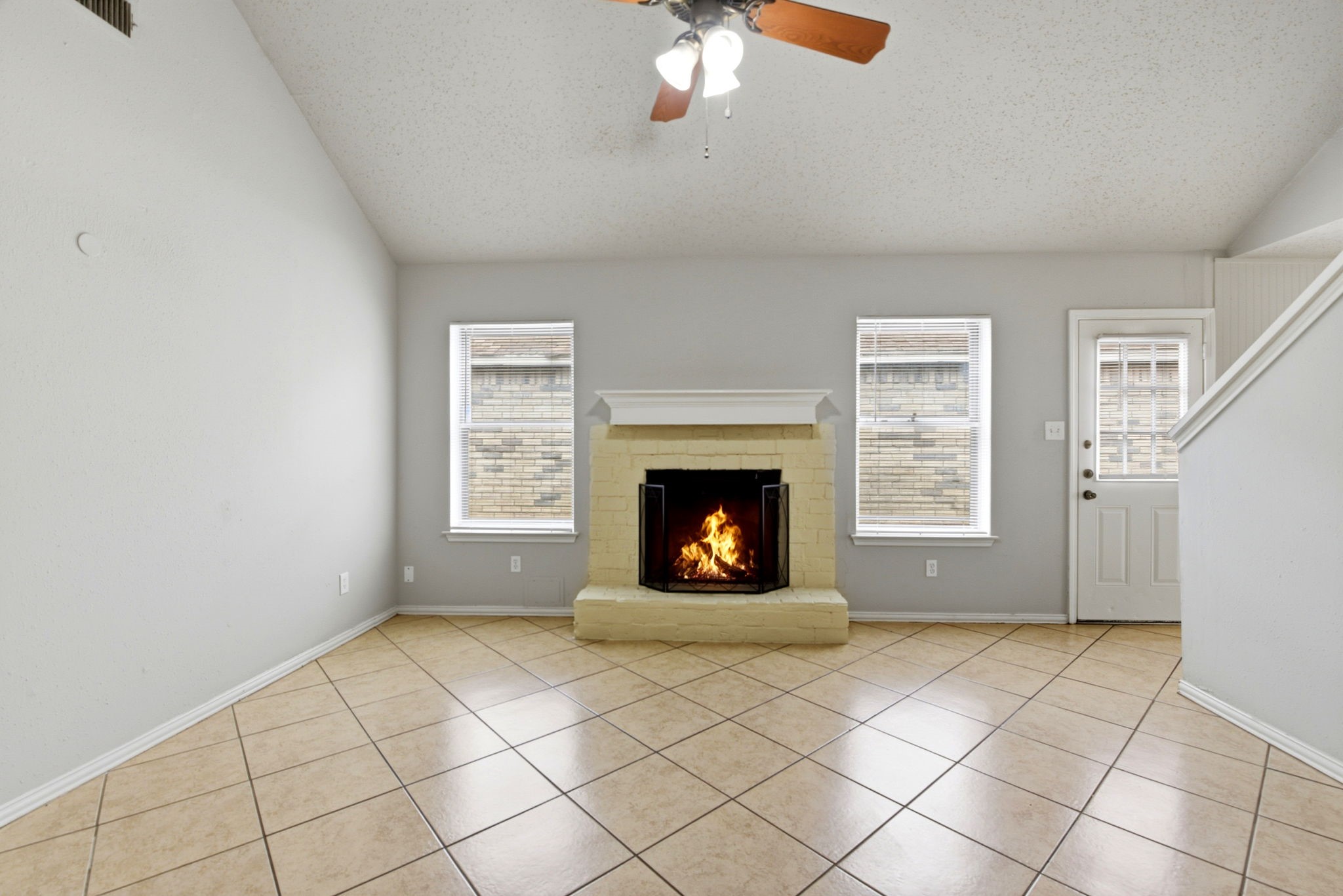 22910 Sherioaks Lane Spring, TX 77389 - Photo 6 of 27 a view of an empty room with window and fire place