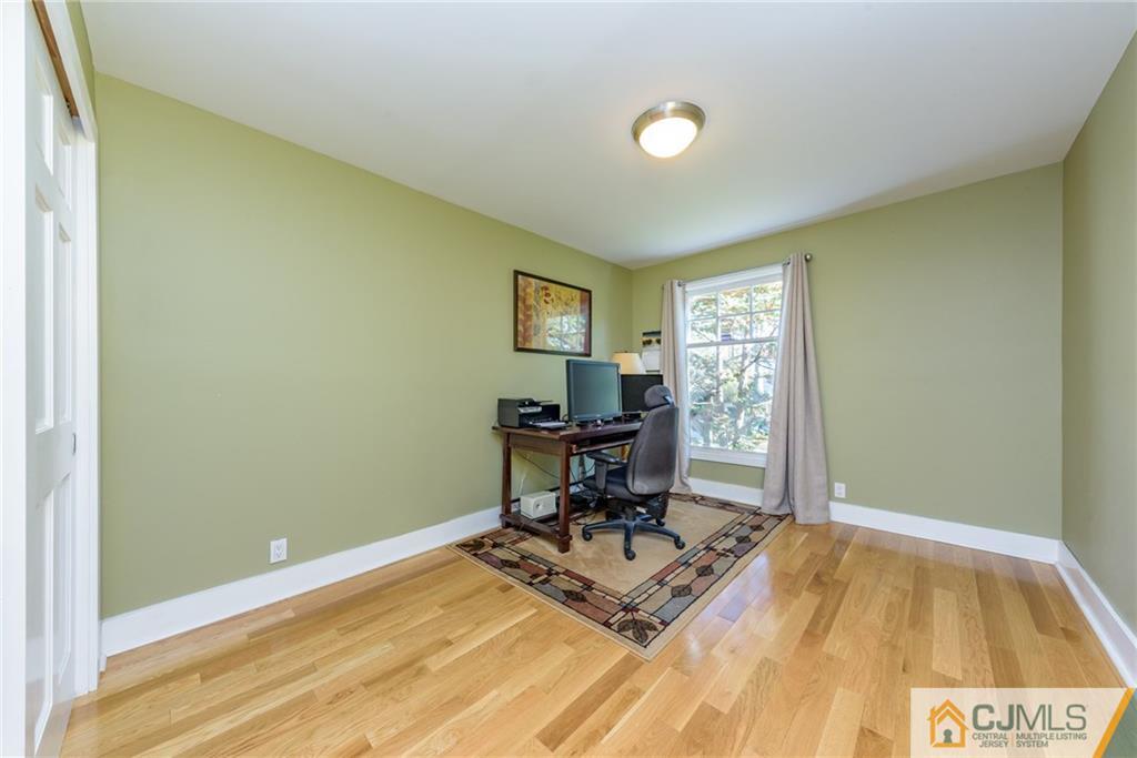 24 East Cliff Road Colonia, NJ 07067 - Photo 22 of 46 a room with a desk and chair