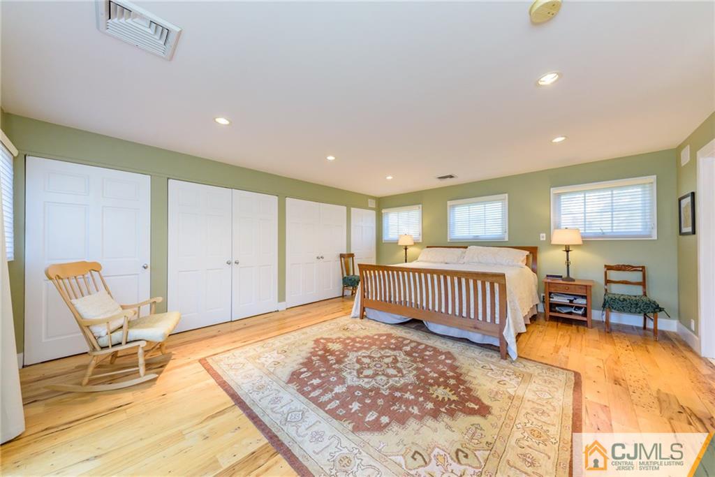 24 East Cliff Road Colonia, NJ 07067 - Photo 30 of 46 a bedroom with furniture and a window