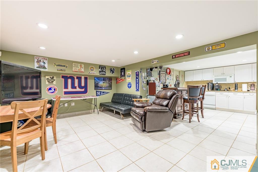 24 East Cliff Road Colonia, NJ 07067 - Photo 33 of 46 a living room with furniture and kitchen view