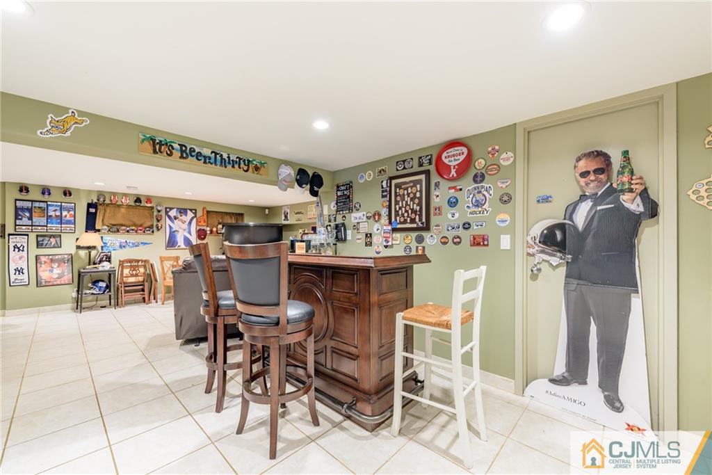 24 East Cliff Road Colonia, NJ 07067 - Photo 35 of 46 a view of a dining room with furniture