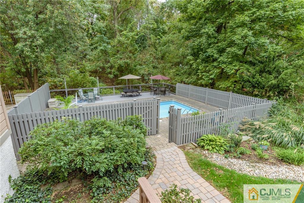 24 East Cliff Road Colonia, NJ 07067 - Photo 40 of 46 a view of a garden from a balcony