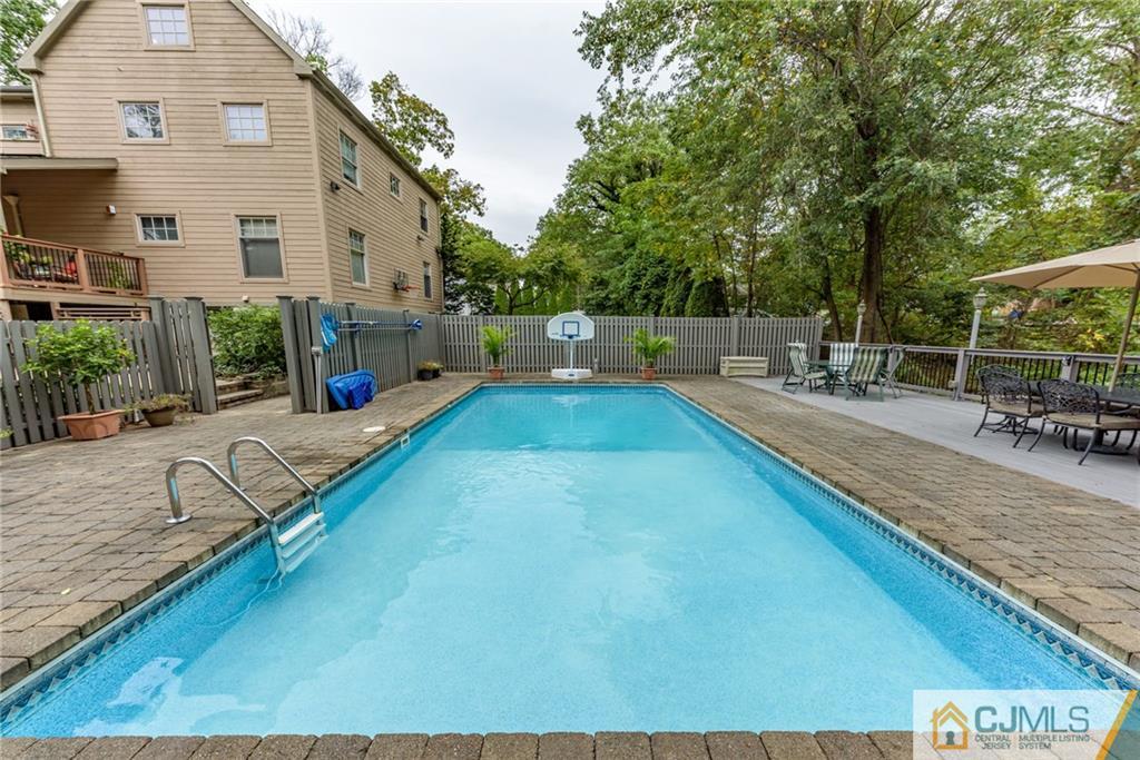 24 East Cliff Road Colonia, NJ 07067 - Photo 42 of 46 a view of a backyard with sitting area