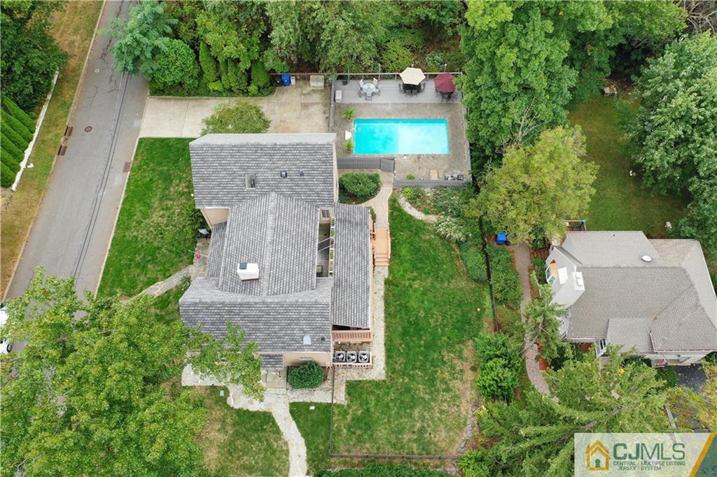 24 East Cliff Road Colonia, NJ 07067 - Photo 46 of 46 an aerial view of a house with outdoor space and street view
