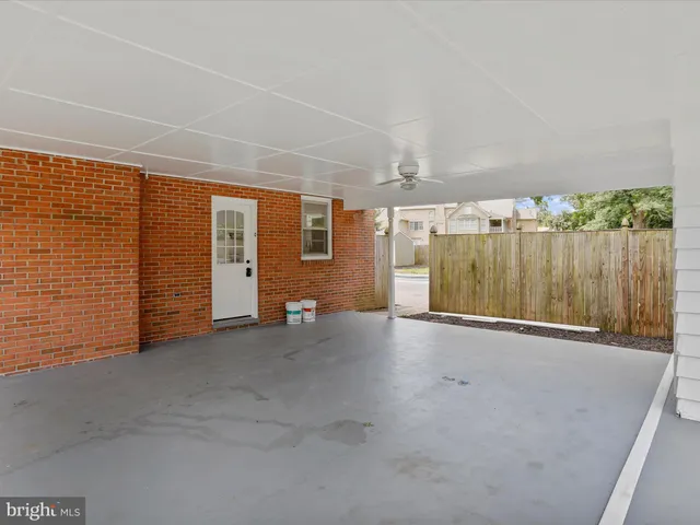 en empty room with windows