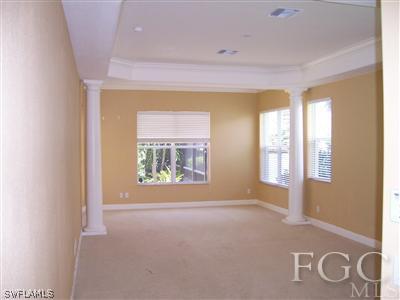 11620 Compass Point Drive Fort Myers, FL 33908 - Photo 8 of 10 an empty room with windows